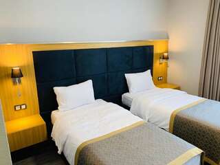 Отель Hotel Konak Момчилград Бюджетный двухместный номер с 2 отдельными кроватями-5